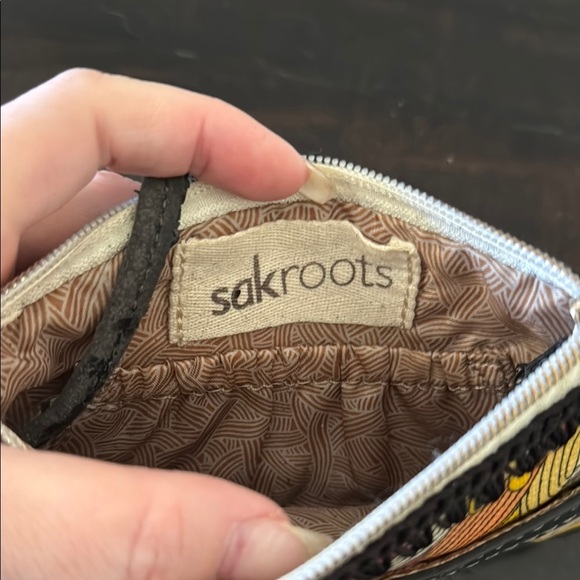 The Sak Vibrant Black and Orange Artistic Clutch Wristlet - Picture 4 of 5